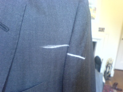 ajustement manche de costume